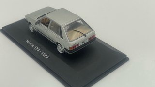(!!) Mazda 323 Mk6 - Ixo Grecia 1/43