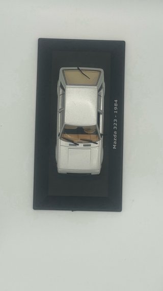 (!!) Mazda 323 Mk6 - Ixo Grecia 1/43