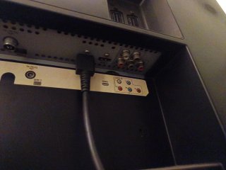 Televisión Philips Negra con adaptador de TDT .