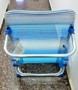 Silla de playa plegable usada en 2 ocasiones