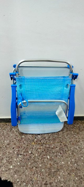 Silla de playa plegable usada en 2 ocasiones
