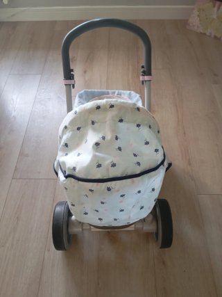 Cochecito de muñecas con capota