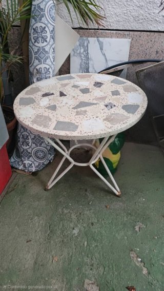 Mesa de patio redonda de piedra