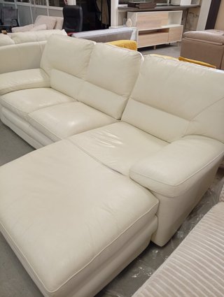 Sofá seccional de piel blanco