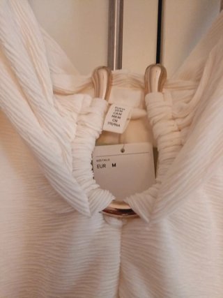 Abito corto H&M con dettaglio gioiello