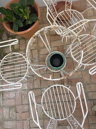 Mesa y sillas de hierro para exterior