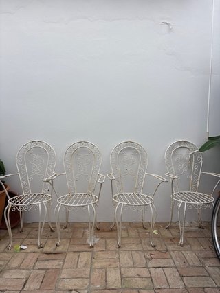 Mesa y sillas de hierro para exterior