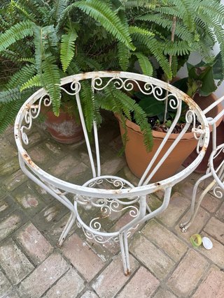 Mesa y sillas de hierro para exterior