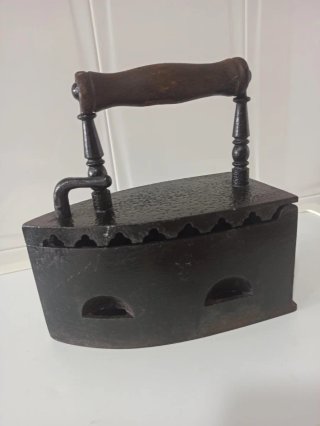 Plancha antigua de carbón