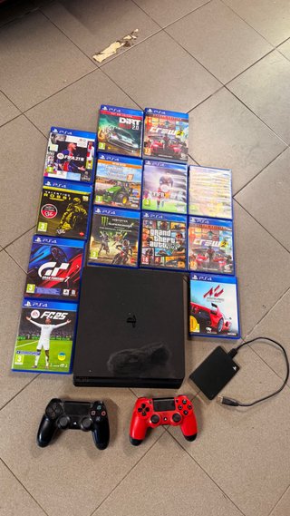 PS4 Slim Negra + 13Juegos + 2 mandos y disco duro