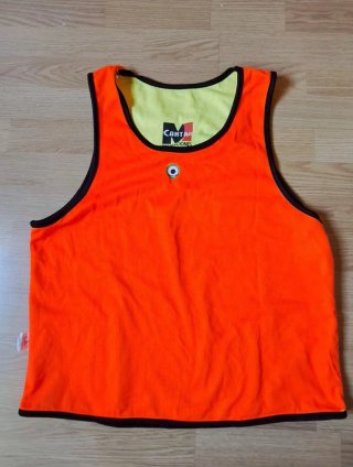 Peto reversible Kedeke Naranja/Amarillo