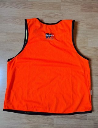 Peto reversible Kedeke Naranja/Amarillo
