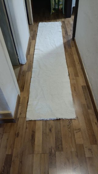 Tappeto da corridoio beige in tessuto