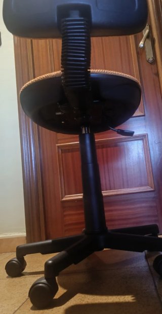 Silla escritorio giratoria naranja ergonómica