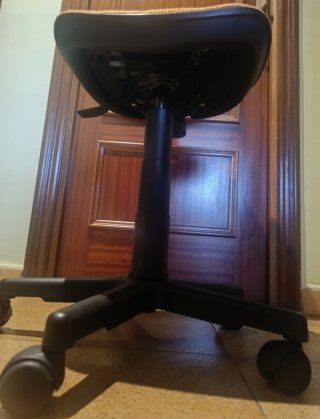 Silla escritorio giratoria naranja ergonómica