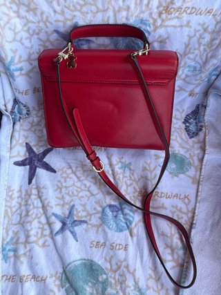Bolso Tous Rojo y Dorado City Hold