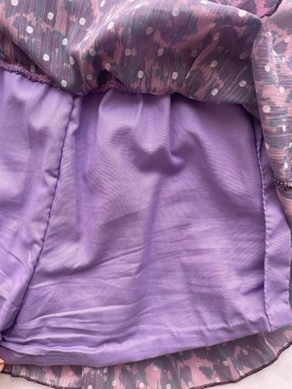 Falda pantalón corta volantes morada estampada