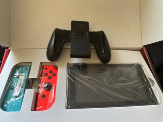Nintendo Switch con juego y accesorios