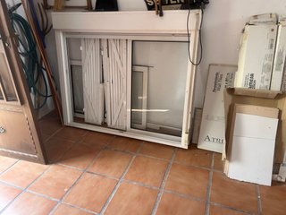 Ventana corredera con reja