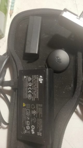 Estabilizador DJI Negro Con Cámara y tarjeta y car