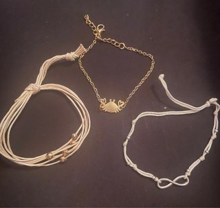 Lote 3 pulseras: cangrejo, infinito, multicordón