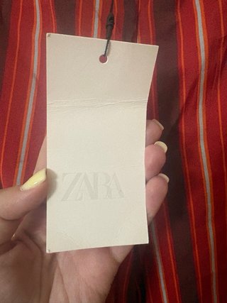 Pantalones Zara rayas rojos y marrones
