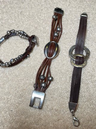 Pack 3 pulseras UNOde50 plata y piel