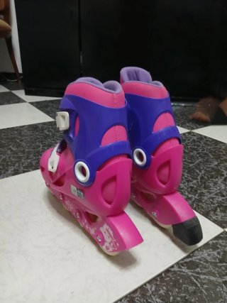 Patines nuevos rosas y morados