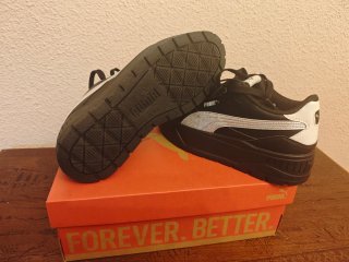 Zapatillas Puma de piel negras y plateadas