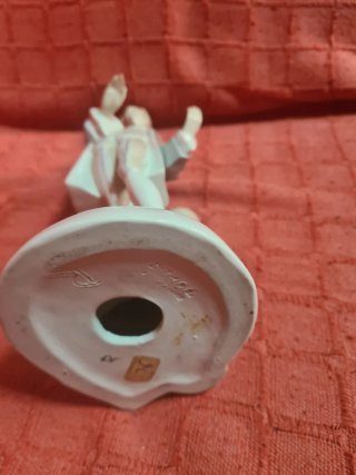 Figura de porcelana hombre clásico