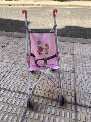 Silla de paseo para muñecas rosa