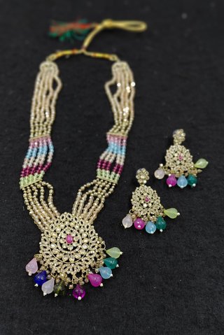 Parure collana e orecchini dorati