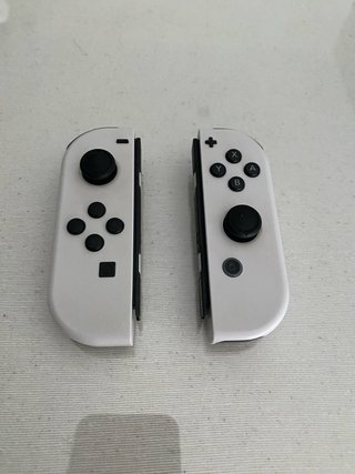 Nintendo Switch OLED + Accesorios + 2 Juegos