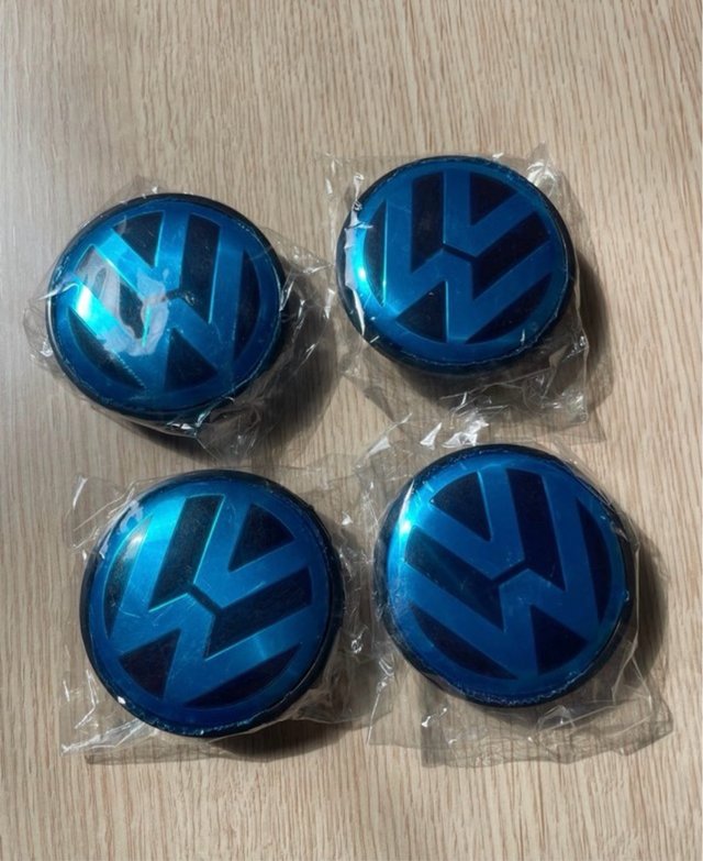 Tapabujes VW 75mm Azul (4 unidades)