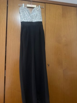Mono elegante lentejuelas y pantalón negro