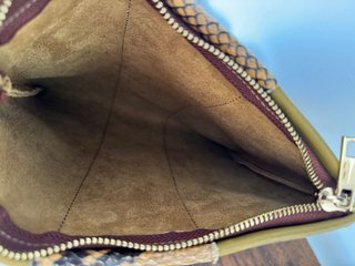 Borsa in pelle con inserto pitone