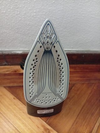 Plancha de vapor azul y blanca