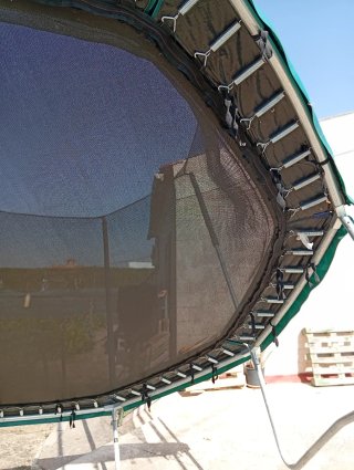 Cama elástica con red de seguridad