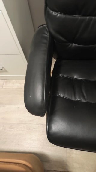 Sillón polipiel reclinable y masajeador negro