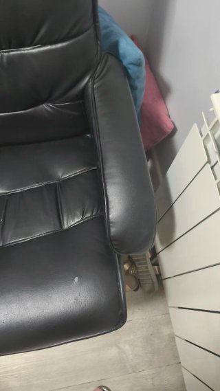 Sillón polipiel reclinable y masajeador negro