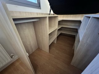 Cama alta con almacenaje y cajones como escalera