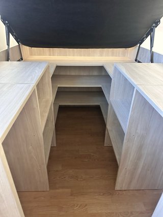 Cama alta con almacenaje y cajones como escalera