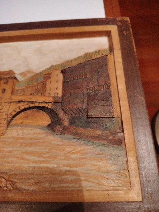 Cuadro tallado en madera puente río
