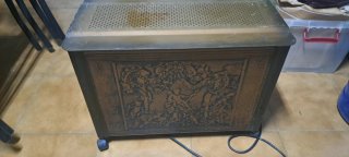 Calefactor antiguo metal y madera