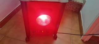 Calefactor antiguo metal y madera