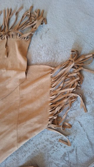 Chaqueta marrón con flecos