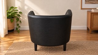 Sillón negro tipo barril