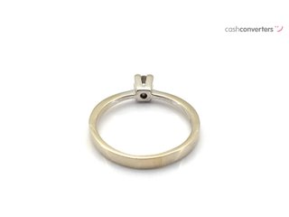 anillo oro 18k con piedra con diamante