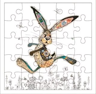 Puzzle infantil de liebre en campo