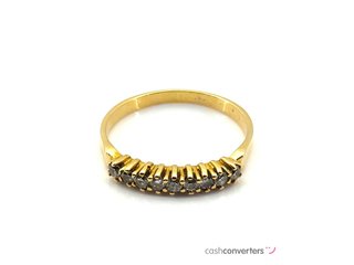 anillo oro 18k con piedra con diamante